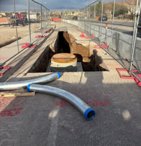 Underground utility trenching and conduit installation during the Van Wagenen Street Improvements project in Henderson, Nevada